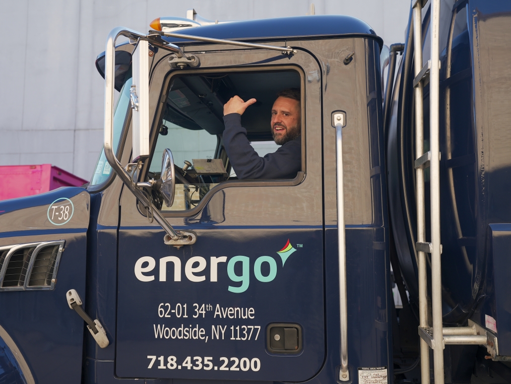 Energo truck driver preparing fuel delivery