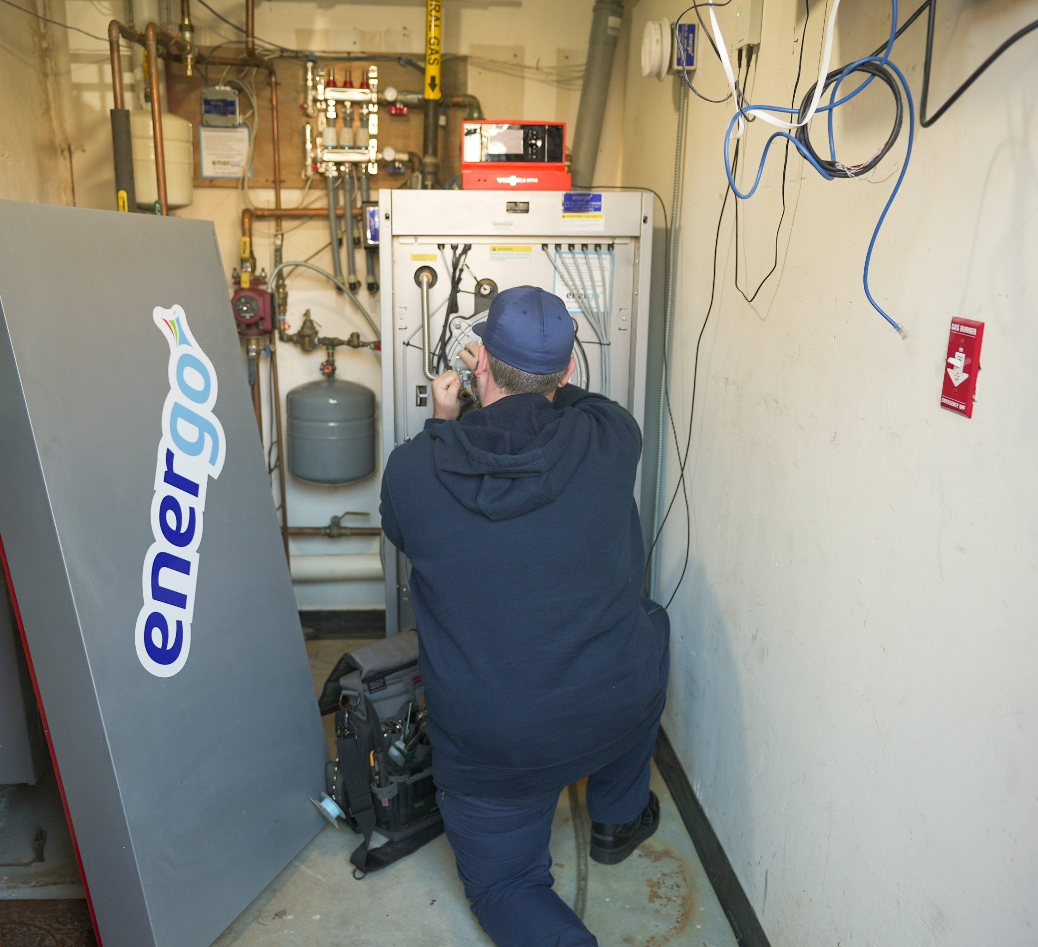 Energo HVAC maintenance technician working in NYC building