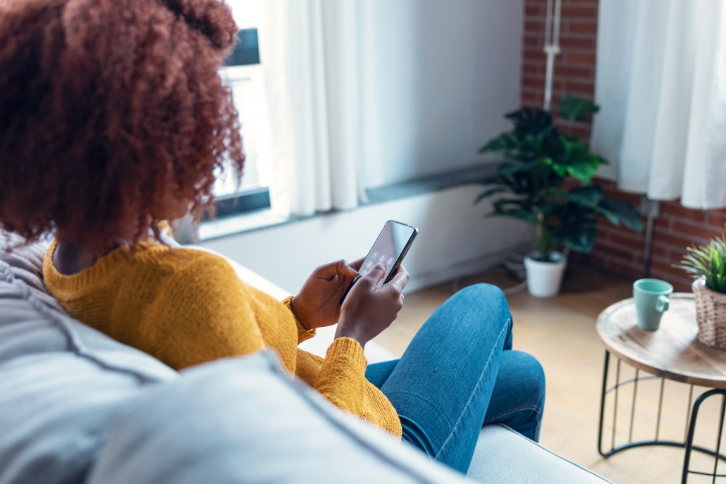 Energo customer checking heating oil service on mobile app