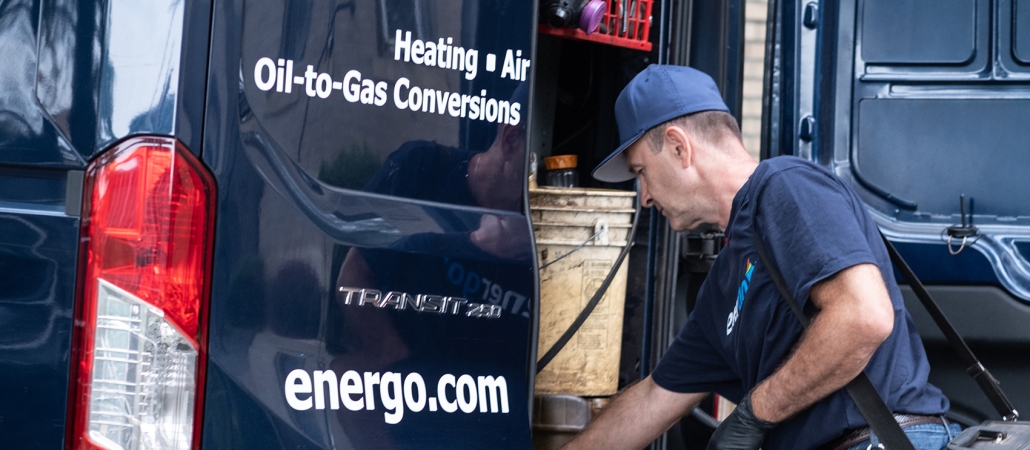 Energo technician performing boiler maintenance