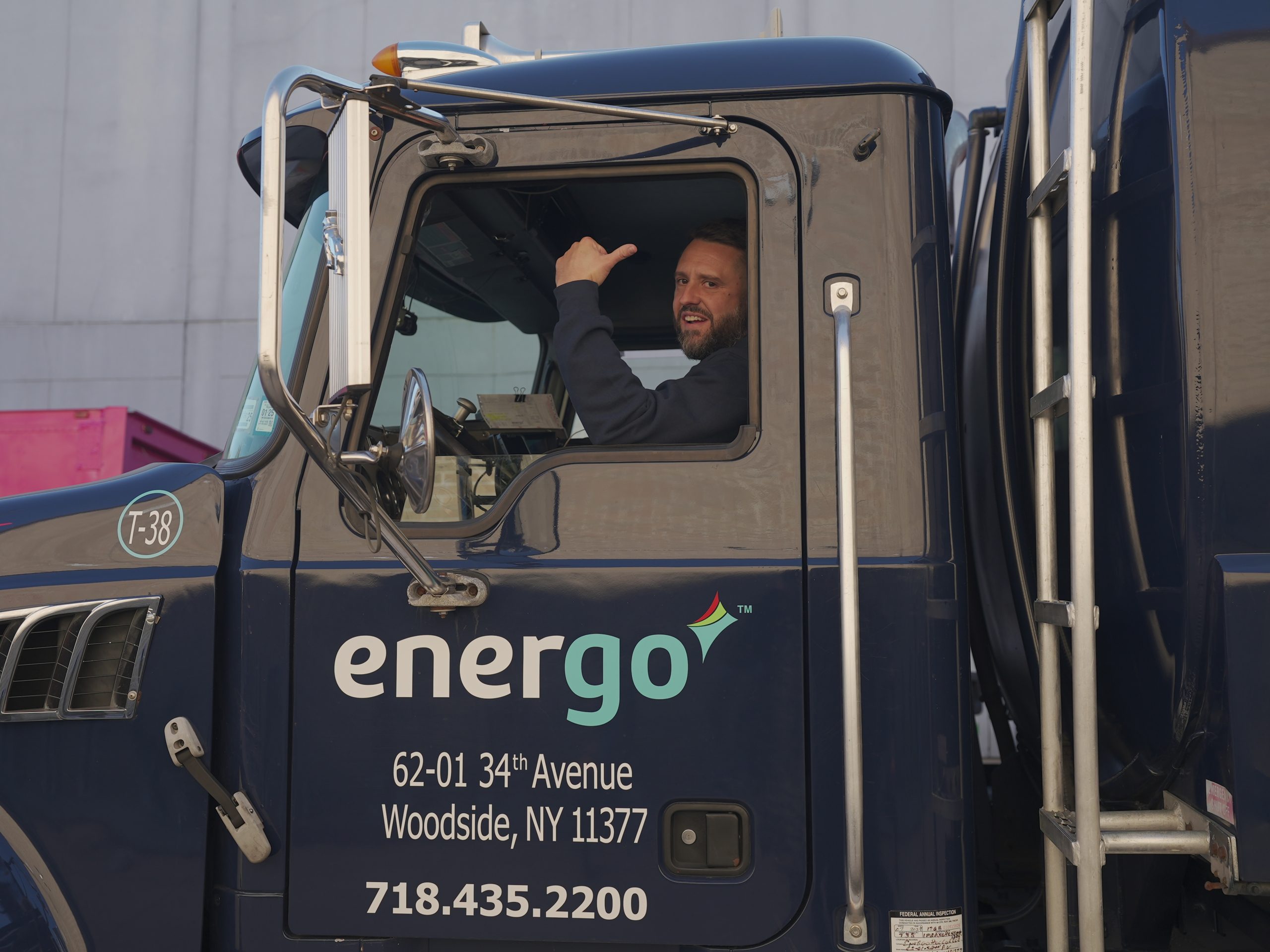 Energo truck driver operating delivery vehicle in NYC