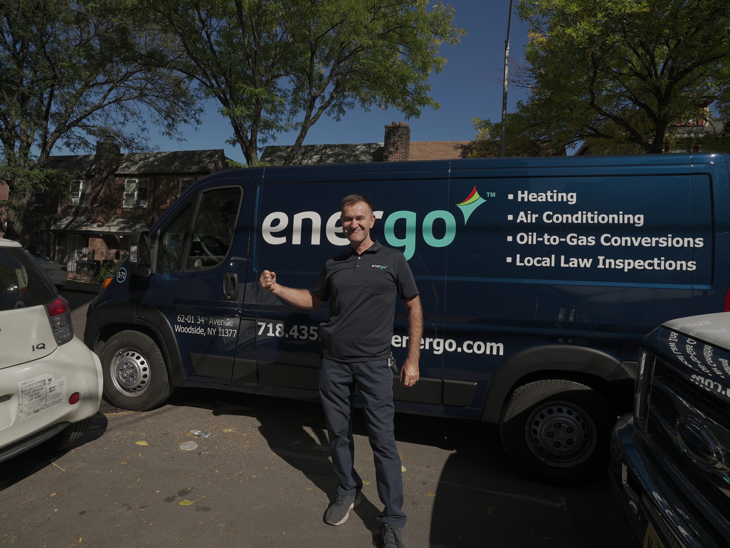 Energo field technician outside service van in New York