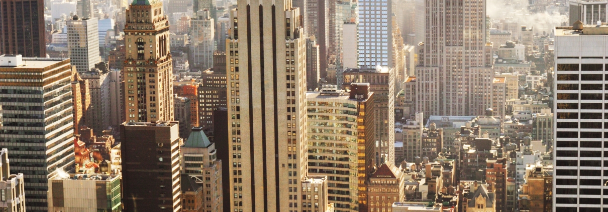 Midtown Manhattan skyline with tall buildings and Central Park in distance