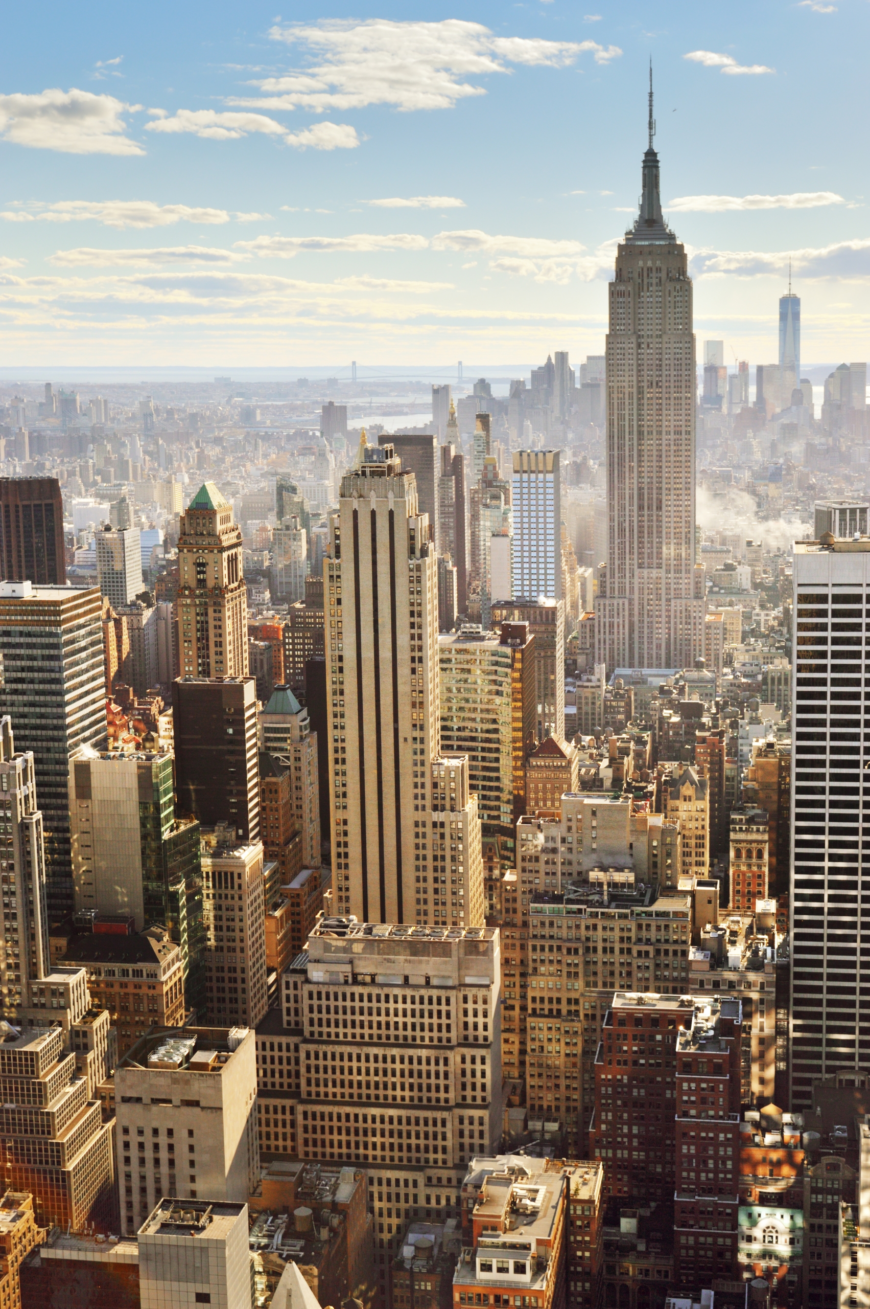 Midtown Manhattan skyline with tall buildings and Central Park in distance