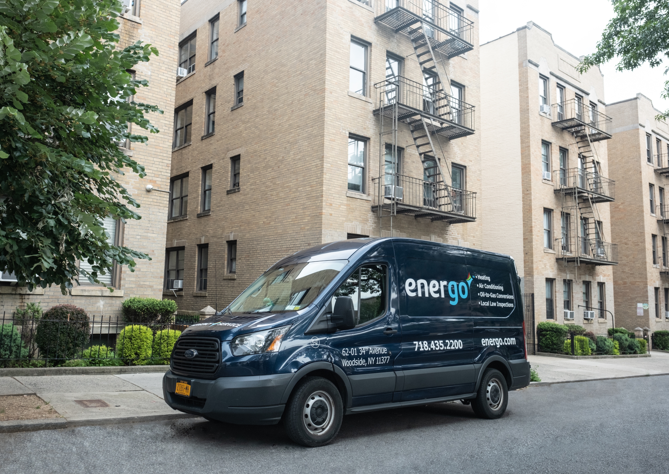 Energo service van parked outside residential apartment building