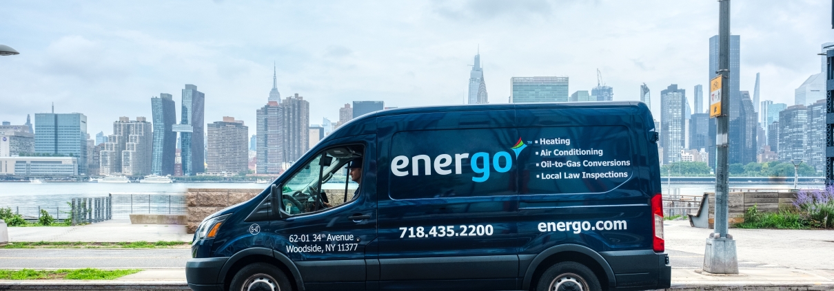 Energo residential heating oil delivery truck at NYC facility during winter