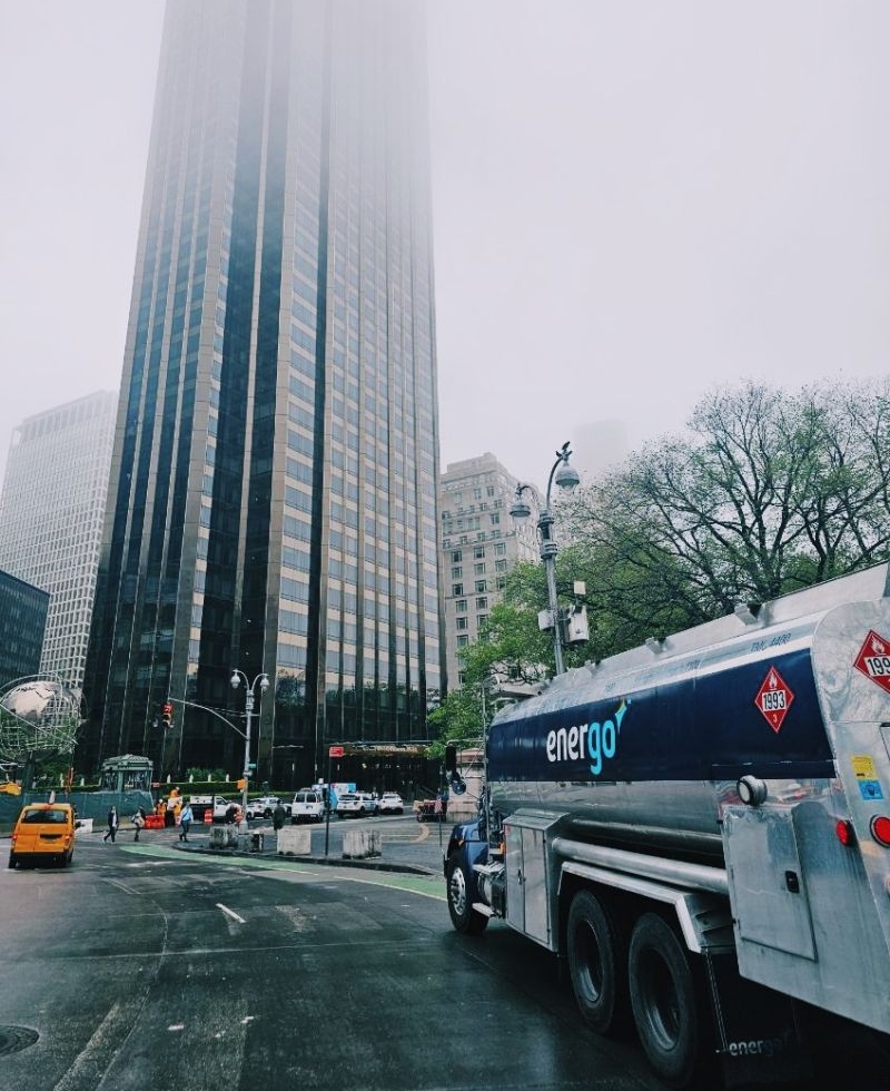 Energo heating oil truck on NYC street with skyscrapers in background